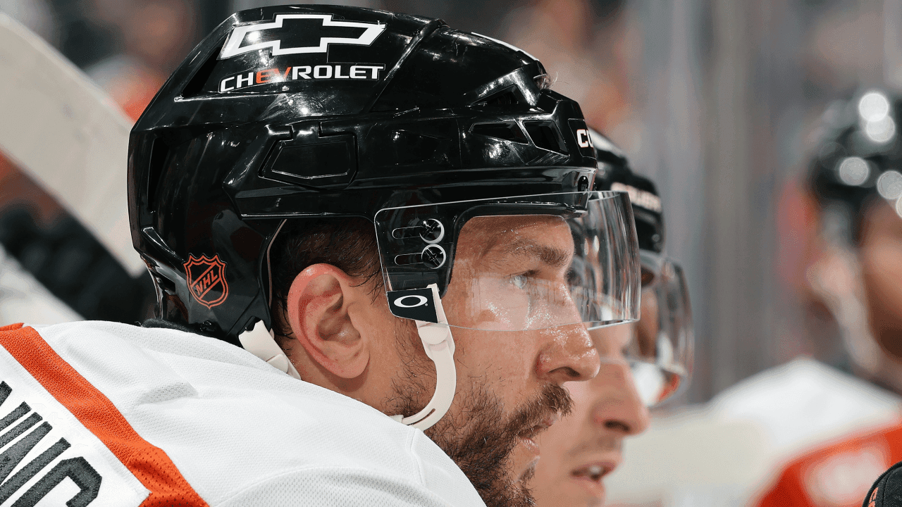 PHILADELPHIA, PENNSYLVANIA - APRIL 13: Luke Glendening #41 of the Philadelphia Flyers looks on from the bench during the first period against the Carolina Hurricanes at the Xfinity Mobile Arena on April 13, 2026 in Philadelphia, Pennsylvania.