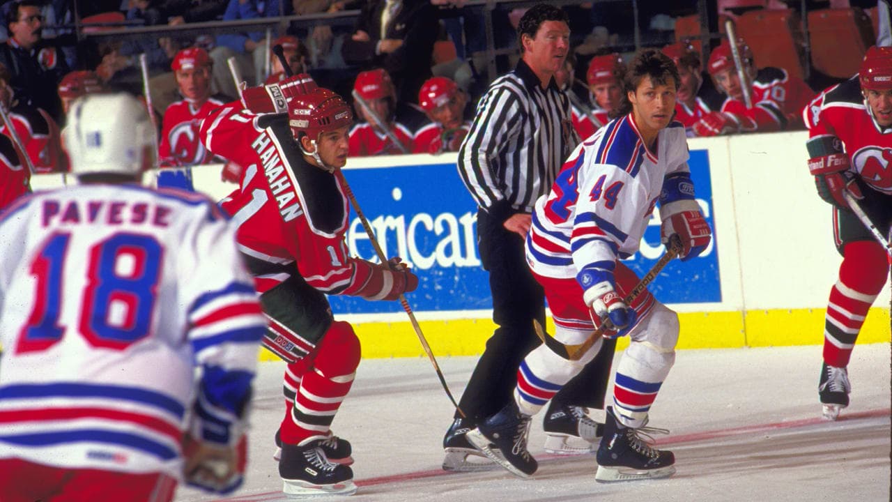 Ron Duguay #44 of the New York Rangers and Brendan Shanahan #11 of the New Jersey Devils skate during game action on November 10, 1987 at Madison Square Garden in New York, NY. New Jersey won 3-2.