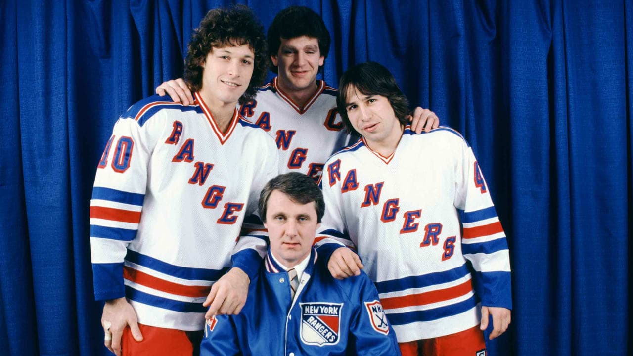 Ron Duguay #10, Barry Beck #3, Mark Pavelich #40 and head coach Herb Brooks pose for a portrait before an NHL game circa December, 1981 at the Madison Square Garden in New York, New York. 
