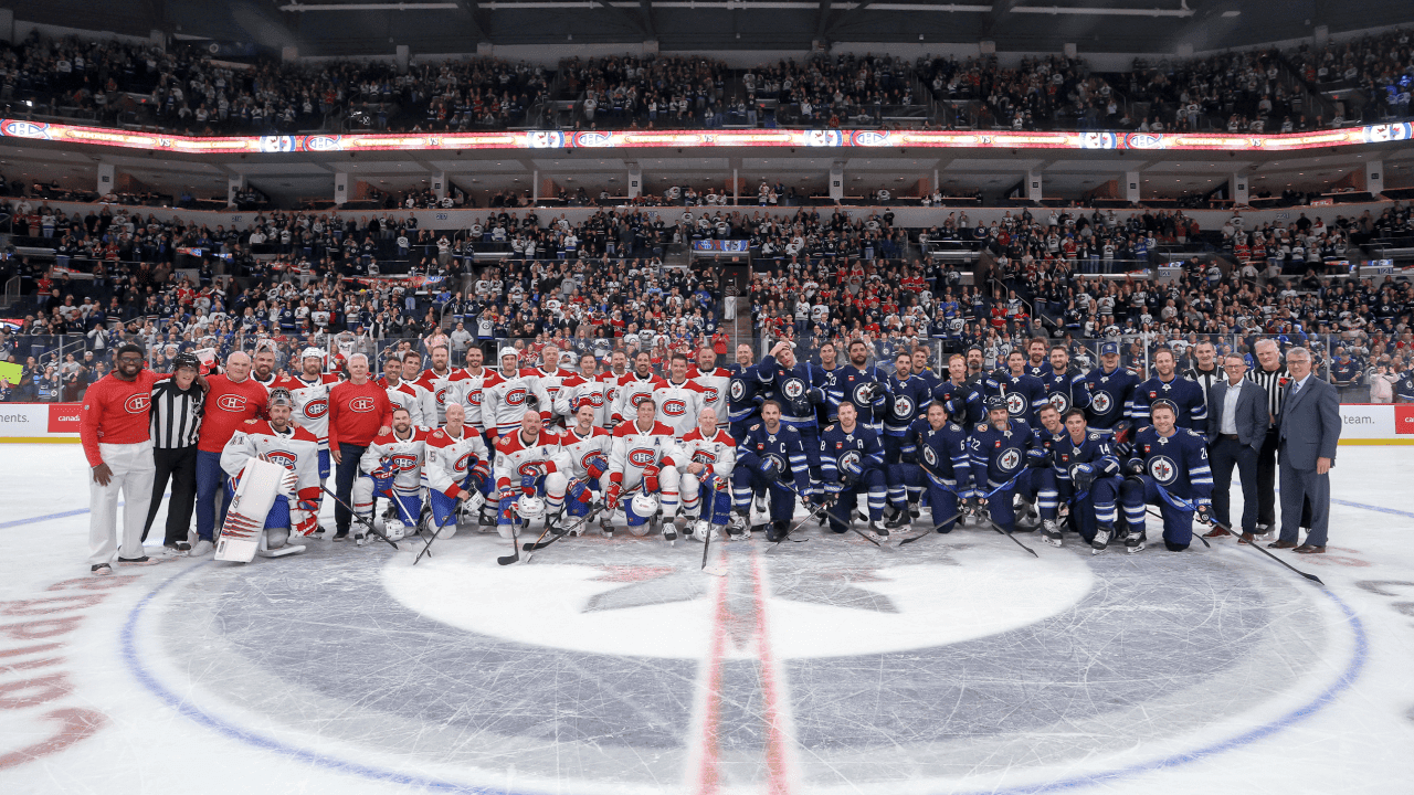 WINNIPEG, CANADA - OCTOBER 24: Players on the Montreal Canadiens alumni and Winnipeg Jets alumni pose on the ice following the 2026 Alumni Game at Canada Life Centre on October 24, 2026 in Winnipeg, Manitoba, Canada.