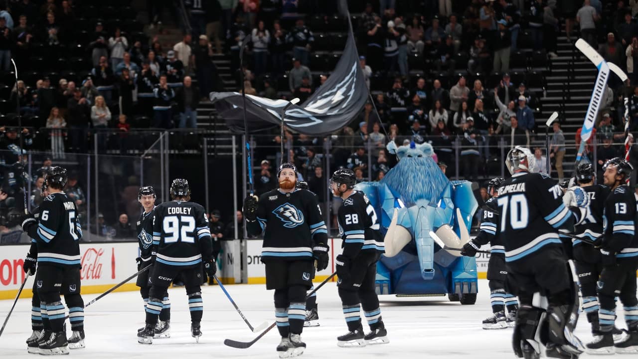 Liam O'Brien #38 of the Utah Mammoth joins other teammates as they celebrate their win over the Nashville Predators at the Delta Center on April 9, 2026 in Salt Lake City, Utah.