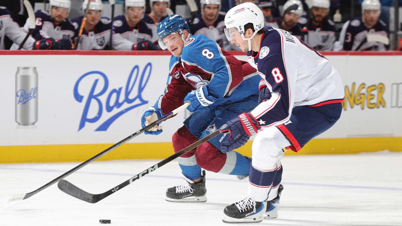 Cale Makar #8 of the Colorado Avalanche skates against Zach Werenski #8 of the Columbus Blue Jackets at Ball Arena on January 10, 2026 in Denver, Colorado. 