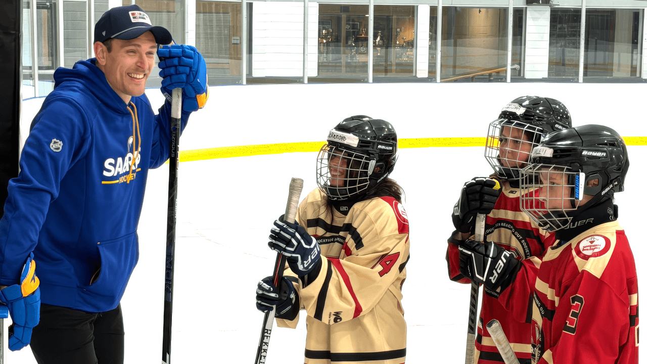 Beck Malenstyn spends time with kids from HEROS Hockey.