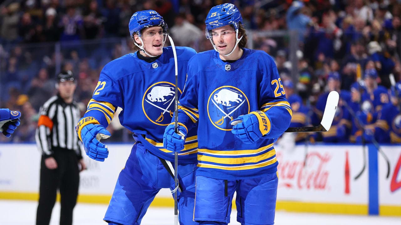 Tage Thompson #72 of the Buffalo Sabres celebrates his first period goal against the Vancouver Canucks with Owen Power #25 during an NHL game on January 06, 2026 at KeyBank Center in Buffalo, New York