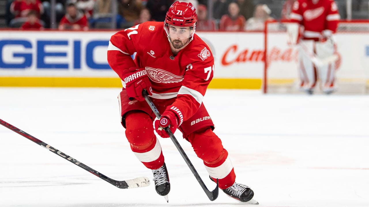 Dylan Larkin #71 of the Detroit Red Wings skates with the puck during overtime against the Washington Capitals at Little Caesars Arena on January 29, 2026 in Detroit, Michigan. 
