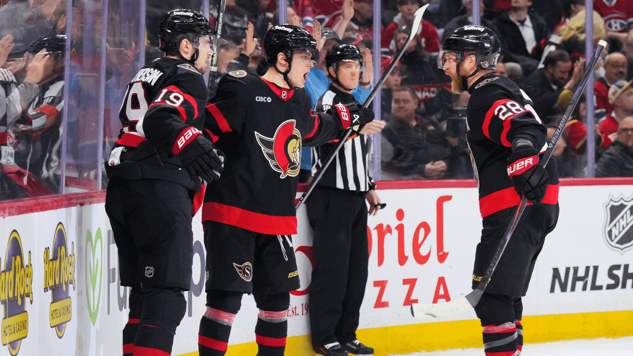 Tim Stützle #18 of the Ottawa Senators celebrates his first-period goal
