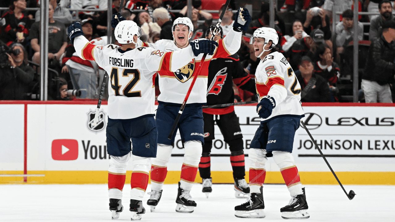 Defenseman Gustav Forsling (42) of the Florida Panthers celebrates with Forward Brady Tkachuk (8) of the Florida Panthers and Center Carter Verhaeghe (23) of the Florida Panthers after scoring in overtime 