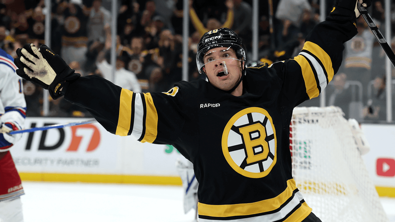 JJ Peterka #10 of the Boston Bruins celebrates after scoring against the New York Rangers