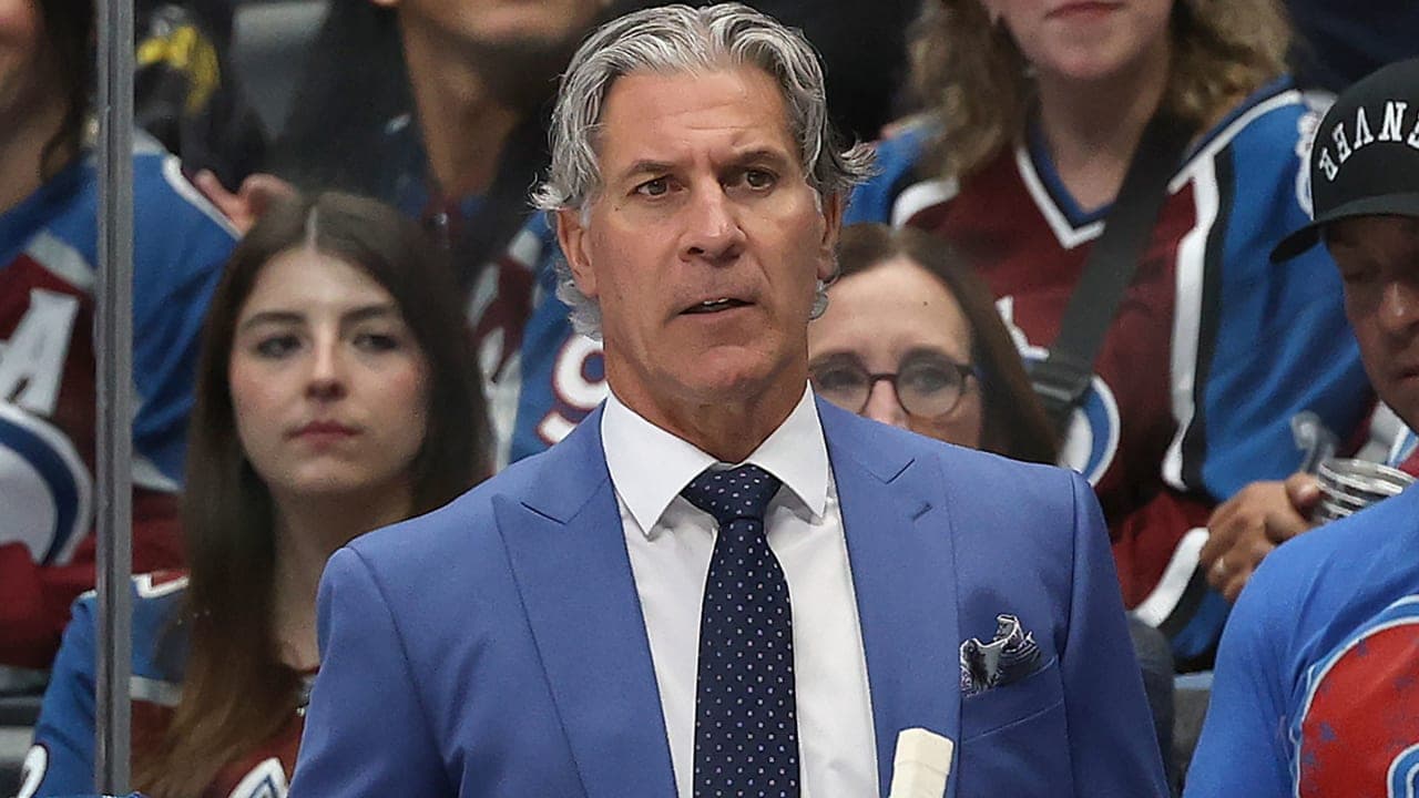 Head coach Jared Bednar of the Colorado Avalanche watches as his team plays the Utah Mammoth in the first period at Ball Arena on October 09, 2025 in Denver, Colorado. 