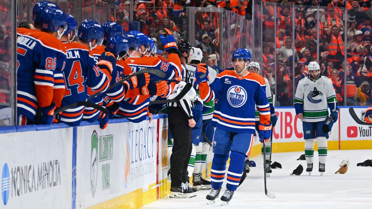 Evan Bouchard #2 of the Edmonton Oilers celebrates a third-period goal during the game against the Vancouver Canucks at Rogers Place on September 29, 2026, in Edmonton, Alberta, Canada. 