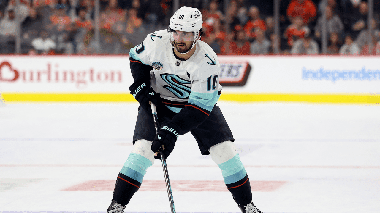 PHILADELPHIA, PENNSYLVANIA - OCTOBER 13: Matty Beniers #10 of the Seattle Kraken handles the puck during a game against the Philadelphia Flyers at Xfinity Mobile Arena on October 13, 2026 in Philadelphia, Pennsylvania.