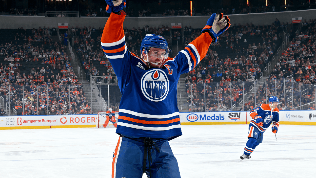  Connor McDavid #97 of the Edmonton Oilers celebrates a first-period goal by Leon Draisaitl #29 during the game against the Carolina Hurricanes at Rogers Place on October 22, 2026, in Edmonton, Alberta, Canada.