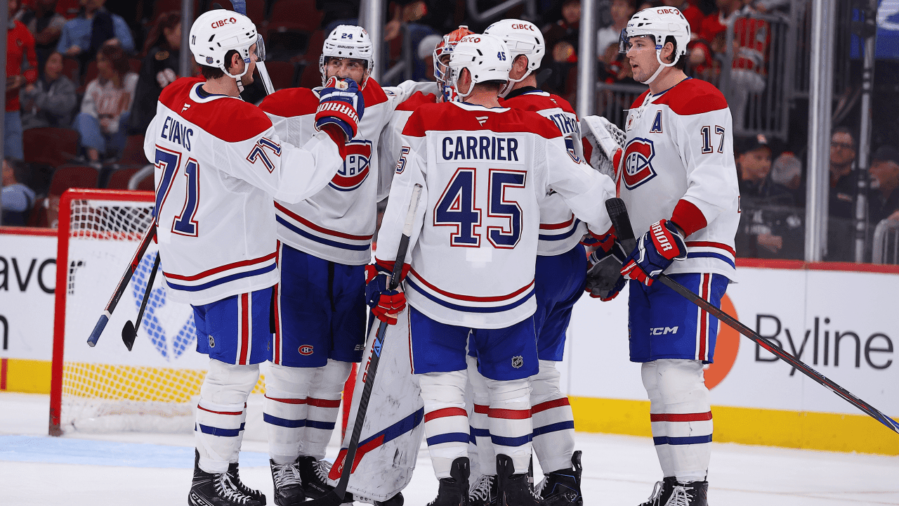 Mike Matheson #8 of the Montreal Canadiens celebrates with teammates