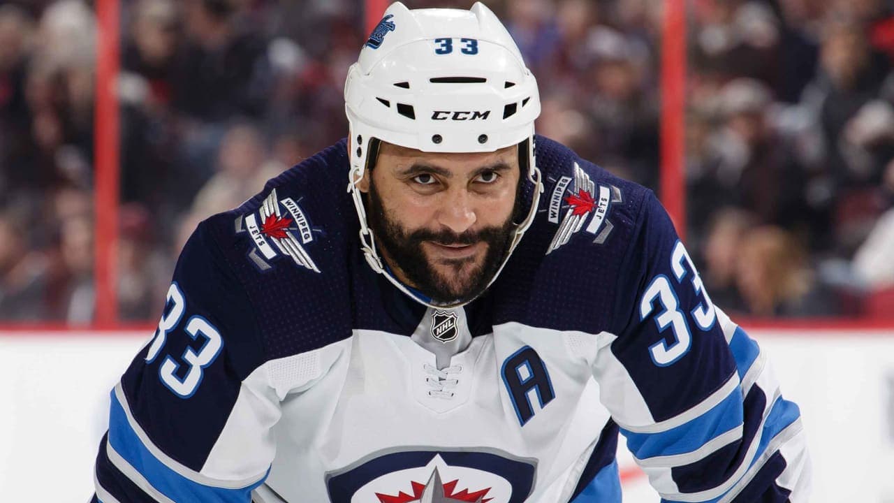Dustin Byfuglien #33 of the Winnipeg Jets looks on during a face-off against the Ottawa Senators at Canadian Tire Centre on February 9, 2019 in Ottawa, Ontario, Canada.