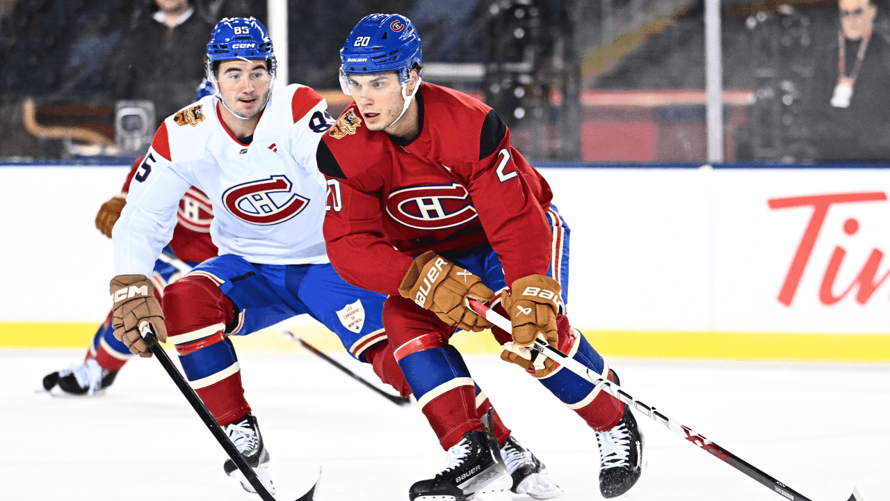 Alexandre Texier #85 of the Montreal Canadiens defends Juraj Slafkovsky #20 during practice 